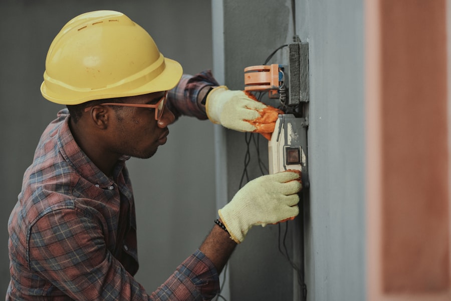 Technician installing broadband fiber connection
